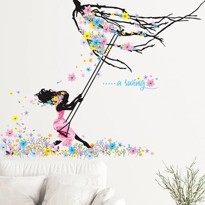 Dettaglio dell'adesivo murale ragazza su altalena con fiori e motivi colorati