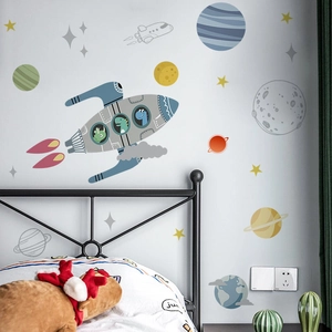 Cartoon space rocket wall decal with dinosaurs and colorful planets for kids room decor