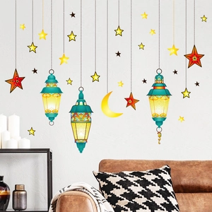 Detailed Ramadan wall stickers showing green lanterns, stars and moon on white wall