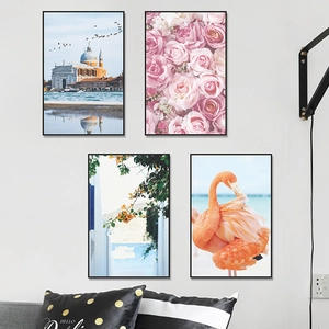 Set of 4 modern wall art frames featuring European architecture, flowers, and flamingos