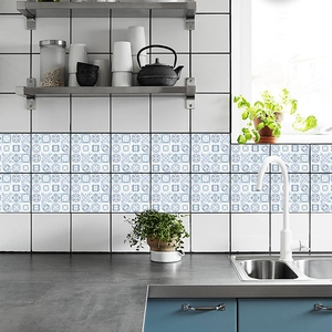 Self-adhesive kitchen tile stickers with blue geometric patterns for wall decor