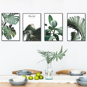 Set of four Nordic minimalist tropical leaf wall art frames with Monstera and Palm prints