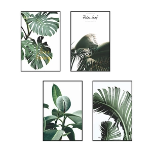 Set of four tropical Monstera and Palm leaf framed wall art prints in Nordic style