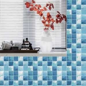 Close-up of blue mosaic adhesive wall tile sticker with waterproof PVC texture