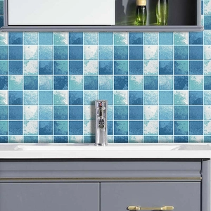 Detailed blue mosaic tile stickers with vintage texture applied to bathroom wall tiles