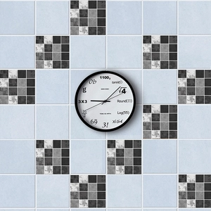 Modern mathematical wall clock with black frame and math formula markers on blue tile