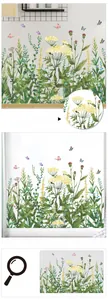 Detail display of butterfly and floral wall stickers with vibrant meadow flower designs