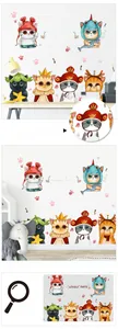 Detail showing the six cute cartoon cat wall stickers with festive hats and costumes