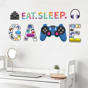 Colorful Eat Sleep Game wall sticker with controller icons on a modern white wall decor
