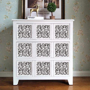 Modern white dresser with black and white geometric art patterns for home storage decor