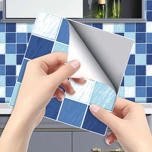 Close-up showing the easy peel-and-stick self-adhesive backing of blue mosaic tile stickers