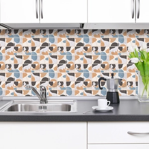 Detail of self-adhesive Nordic abstract wall stickers applied on a modern kitchen backsplash