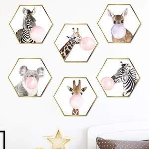 Set of six hexagonal wall art pieces featuring animals blowing bubbles in gold frames