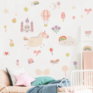 Detail view of cartoon unicorn and pink castle wall decals in a white bedroom scene
