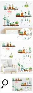 Detail showing hand-painted PVC wall stickers featuring hanging plants and bookshelves