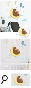 Detail showing cartoon bear on crescent moon with stars wall stickers for nursery decor