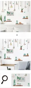 Detail showing Nordic style wall stickers with succulents, geometric pendants and motivational quote