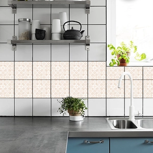 Self-adhesive tile stickers with light orange floral patterns for kitchen wall decor