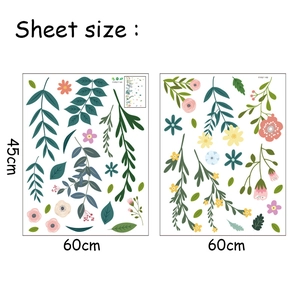 Detailed sheet layout of green leaves and floral wall stickers showing 45x60cm dimensions