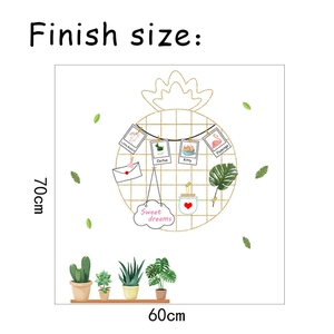 Detail showing cartoon pineapple grid wall sticker dimensions of 70x60cm on white background