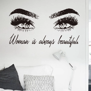 Minimalist wall decal with woman eyes and lashes saying Woman is always beautiful