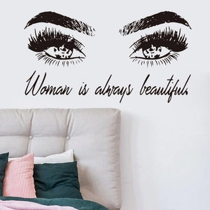 Bedroom wall decal with long eyelashes and Woman is always beautiful quote