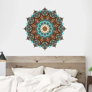 Symmetric mandala wall sticker with blue and brown patterns for a modern bedroom decor