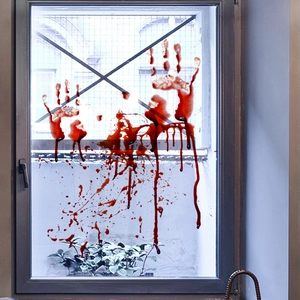 Halloween bloody handprint window clings with realistic red blood splatters and drips