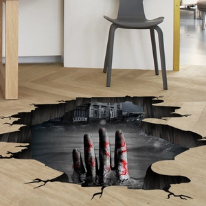 Detailed view of 3D Halloween floor decal showing a zombie hand from a cracked floor