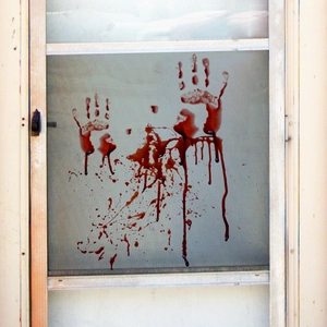 Halloween bloody handprint window stickers with realistic red blood splatters for party decor