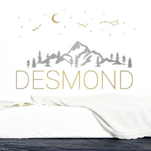Customized nursery wall decal with grey mountains, golden moon, and Desmond name