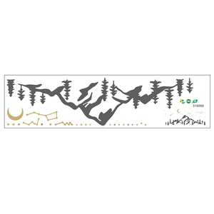 Detail view of PVC wall sticker with silhouette mountains, pine forest and golden moon