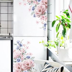 Detail of floral wall stickers with pink and purple watercolor flowers on a white surface