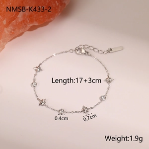 Detailed view of dainty star bracelet with cubic zirconia charms and adjustable clasp