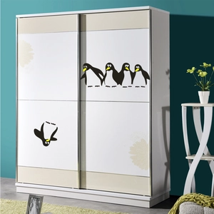 Modern sliding door wardrobe featuring minimalist penguin graphics and white floral patterns