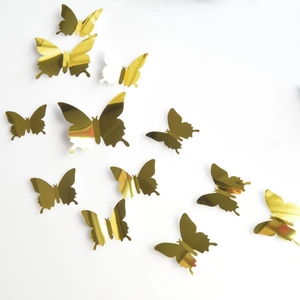 Close-up of golden mirror 3D butterfly wall stickers with high reflective finish