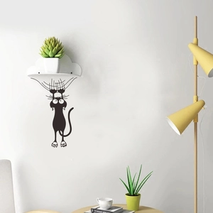 Sticker mural chat noir grimpant sur étagère avec griffures pour déco maison