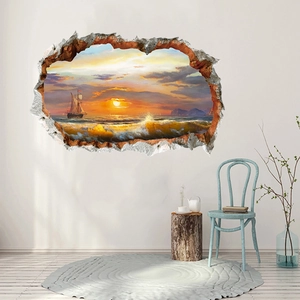Macro detail of a 3D ocean sunset wall sticker with sailboat on a white wall decor