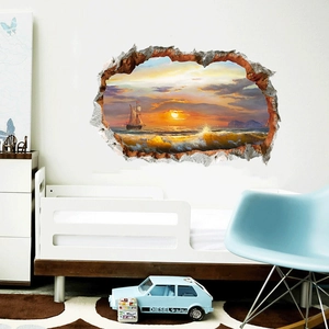 3D hole wall sticker showing sunset beach and sailboat in a modern bedroom