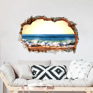 3D ocean beach wall sticker displayed above a sofa in a modern minimalist living room