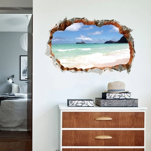 Detail showing 3D wall sticker with tropical beach view on a white bedroom wall