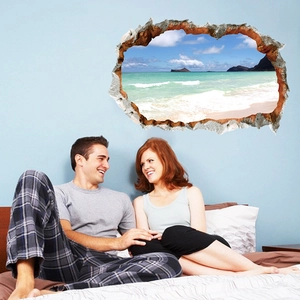 Detailed 3D broken wall effect wall sticker showing tropical ocean beach view