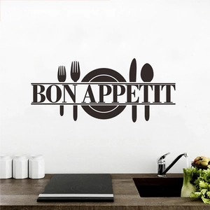 Detail showing Bon Appetit wall decal with fork and knife design in a kitchen scene