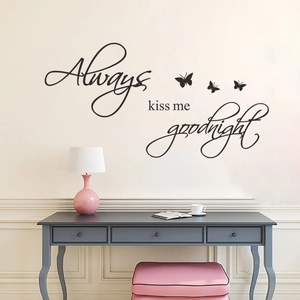 Black 'Always Kiss Me Goodnight' wall decal with butterfly silhouettes for bedroom decor