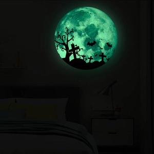 Luminous Halloween wall sticker showing a glowing green moon with bats and graveyard scenes