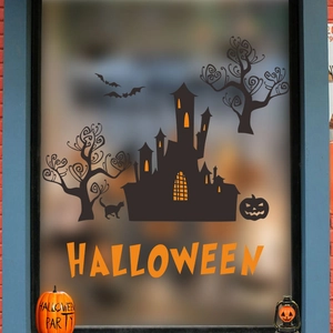 Halloween wall stickers featuring castle, bats and orange text on a window background