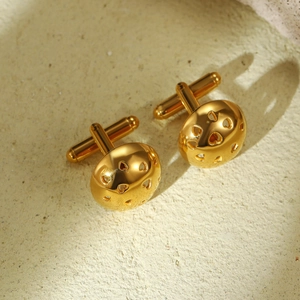 Polished gold stainless steel cufflinks featuring elegant hollow heart patterns for shirts