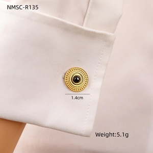 Detailed close-up of 1.4cm turquoise stainless steel cufflinks on white shirt cuff