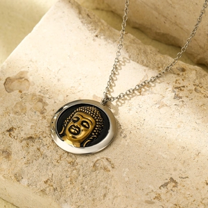 Retro stainless steel round necklace featuring a gold Buddha head pendant on stone