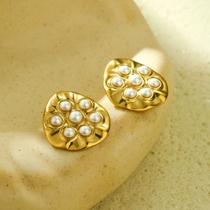 Irregular 18K gold plated hoop earrings with white pearls in a floral cluster design